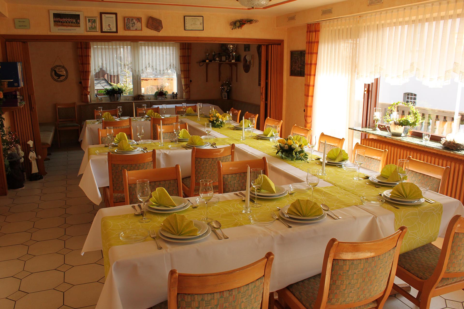 Our Restaurant with neatly decorated tables before the feast